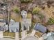 Aerial view of backyard with patio, outdoor furniture, and privacy from mature landscaping at 10842 Belmont Cir, Indianapolis, IN 46280