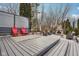 A well appointed patio area with a fire pit and wooden deck are perfect for outdoor entertaining and relaxation at 10842 Belmont Cir, Indianapolis, IN 46280