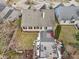Image of the patio and deck with an outdoor seating area and the yard with greenery at 10842 Belmont Cir, Indianapolis, IN 46280