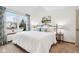 Serene bedroom featuring a plush bed and a window overlooking the neighborhood at 10842 Belmont Cir, Indianapolis, IN 46280