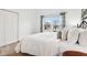 Cozy bedroom with a comfortable bed, window views, and ample natural light at 10842 Belmont Cir, Indianapolis, IN 46280