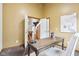 Another view of the well-lit home office with an adjacent room in sight at 10842 Belmont Cir, Indianapolis, IN 46280