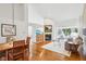Bright living room with hardwood floors, fireplace, vaulted ceiling, and natural light at 10842 Belmont Cir, Indianapolis, IN 46280