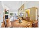 Bright living room with fireplace, exercise area, and natural light from large windows at 10842 Belmont Cir, Indianapolis, IN 46280