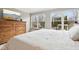 Comfortable bedroom features natural light, an outdoor view, and a large dresser at 10842 Belmont Cir, Indianapolis, IN 46280