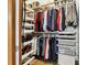 Organized walk-in closet with shelving, hanging rods, and ample storage space at 10842 Belmont Cir, Indianapolis, IN 46280