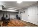 Basement gym with exercise equipment, a colorful rug, and ample room for a complete workout at 128 Wellington Rd, Indianapolis, IN 46260