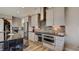 Modern kitchen with stainless steel appliances and dark wood island at 15994 Meadow Frost Ct, Fishers, IN 46037