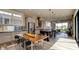 Modern kitchen featuring island, stainless steel appliances, and hardwood floors at 15994 Meadow Frost Ct, Fishers, IN 46037