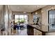 Open concept kitchen with island, stainless steel appliances, and views of backyard at 15994 Meadow Frost Ct, Fishers, IN 46037