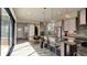 Open concept kitchen with island, stainless steel appliances, and sliding door to patio at 15994 Meadow Frost Ct, Fishers, IN 46037