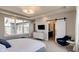 Spacious main bedroom with ensuite bathroom and large windows at 15994 Meadow Frost Ct, Fishers, IN 46037