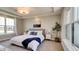 Bright bedroom with large windows, plush bedding, and neutral decor at 15994 Meadow Frost Ct, Fishers, IN 46037