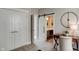 Bright home office with a desk, chair, and barn door entry to a bathroom at 15994 Meadow Frost Ct, Fishers, IN 46037