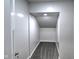 Finished attic space, offering a bonus area with carpeting and modern lighting at 1753 Skyline Dr, Greenwood, IN 46143