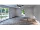 Bright bedroom with gray carpet and large windows at 1753 Skyline Dr, Greenwood, IN 46143