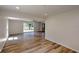 Spacious living room with hardwood floors and a large window offering great natural light at 1753 Skyline Dr, Greenwood, IN 46143