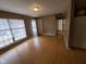 Spacious living room with hardwood floors and access to other rooms at 1908 Edgemont Way, Anderson, IN 46011