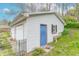 A single car garage that has a blue door at 310 Green St, Plainfield, IN 46168