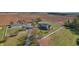 Expansive property featuring a fenced yard, additional outbuilding, and scenic agricultural surroundings at 3101 E State Road 47, Lebanon, IN 46052