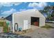 Exterior view of barn with sliding door and exterior utilities at 3101 E State Road 47, Lebanon, IN 46052