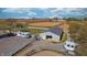 Well-equipped equestrian facility featuring a spacious barn, riding pen, and vehicle parking area at 3101 E State Road 47, Lebanon, IN 46052