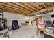 Unfinished basement with exposed ceiling beams and concrete flooring at 3101 E State Road 47, Lebanon, IN 46052