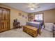 Comfortable bedroom with wooden furniture, dresser, and a window with natural light at 3101 E State Road 47, Lebanon, IN 46052