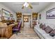 Bright living room features wood floors, lots of natural light, built in shelving and wood trim at 3101 E State Road 47, Lebanon, IN 46052