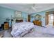 Spacious main bedroom with carpet, ceiling fan, ample closet space, and ensuite bathroom at 3101 E State Road 47, Lebanon, IN 46052