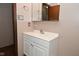 Bathroom vanity with white cabinet and mirror at 3301 Timberbrook Ct, Danville, IN 46122