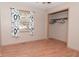 Bedroom with window, closet, and laminate flooring at 3301 Timberbrook Ct, Danville, IN 46122