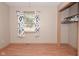 Bedroom with window, closet, and laminate flooring at 3301 Timberbrook Ct, Danville, IN 46122