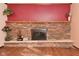 Brick fireplace with wood mantel and decorative accents at 3301 Timberbrook Ct, Danville, IN 46122