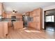 Open kitchen with island and stainless steel appliances at 3301 Timberbrook Ct, Danville, IN 46122