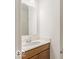Clean bathroom with wood vanity and an updated sink at 349 N Post Oak Dr, Mooresville, IN 46158