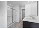 Bright bathroom featuring a glass shower and double vanity at 349 N Post Oak Dr, Mooresville, IN 46158