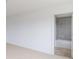Bright bedroom with plush carpeting and an ensuite bathroom at 349 N Post Oak Dr, Mooresville, IN 46158