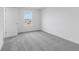 Cozy bedroom featuring a bright window and neutral gray carpet at 349 N Post Oak Dr, Mooresville, IN 46158