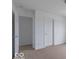Bedroom with two closets and neutral carpeting at 349 N Post Oak Dr, Mooresville, IN 46158