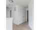 Upstairs hallway with carpet, linen closet and access to bedrooms and bath at 349 N Post Oak Dr, Mooresville, IN 46158
