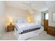 Bedroom offers a large bed with decorative pillows, side tables, and soft lighting for a restful atmosphere at 5030 Nightshade Ln, Noblesville, IN 46062