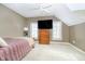 Cozy bedroom features neutral paint, ceiling fan, and a large dresser for ample storage space at 5030 Nightshade Ln, Noblesville, IN 46062