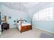 Bright bedroom with a four poster bed and a large arched window at 5030 Nightshade Ln, Noblesville, IN 46062