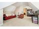 Large bonus room featuring a sofa, armchair, and desk at 5030 Nightshade Ln, Noblesville, IN 46062