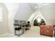 Bonus room featuring vaulted ceilings and dual desk setup at 5030 Nightshade Ln, Noblesville, IN 46062