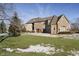 Charming brick home featuring a three-car garage and mature landscaping at 5030 Nightshade Ln, Noblesville, IN 46062