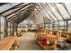 Spacious greenhouse is filled with natural light, providing an ideal environment for growing a variety of plants and flowers at 5030 Nightshade Ln, Noblesville, IN 46062