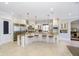 Gourmet kitchen with white cabinetry, granite countertops, and stainless steel appliances at 5030 Nightshade Ln, Noblesville, IN 46062