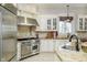 Well-equipped kitchen with stainless steel appliances, granite countertops, and a chef-grade oven range at 5030 Nightshade Ln, Noblesville, IN 46062